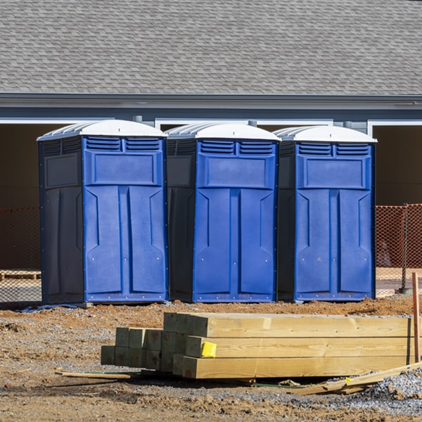 what is the cost difference between standard and deluxe porta potty rentals in Green